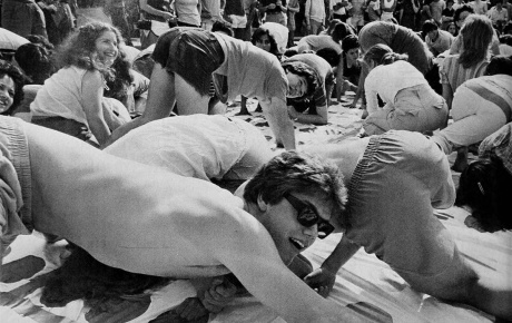 Archival image of students playing a giant Twister game on the Main Green.