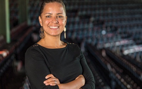 Photograph of Rebekah Splaine Salwasser &rsquo;01 standing in the Boston Red Sox stadium