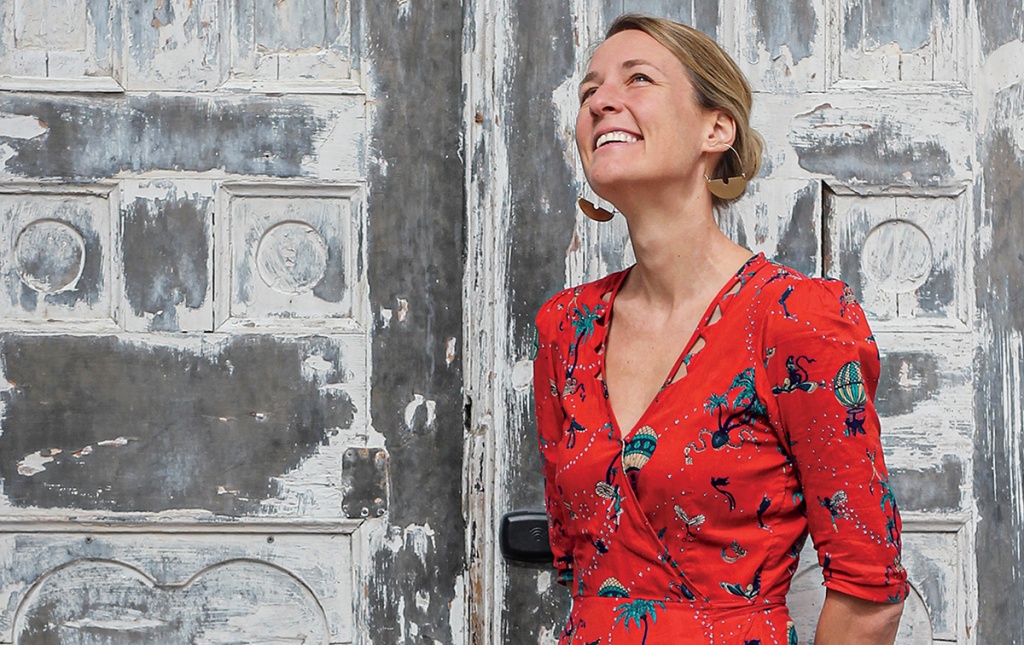 Nathalie Jordi &rsquo;04 stands at the door of her hotel