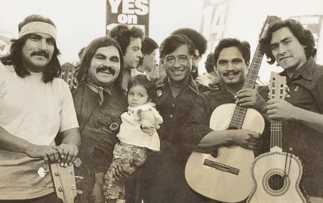 Image of Ramon "Chunky" Sanchez at a United Farm Workers rally with C&eacute;sar Ch&aacute;vez.