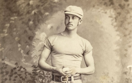 Archival image of J. Lee Richmond with a baseball
