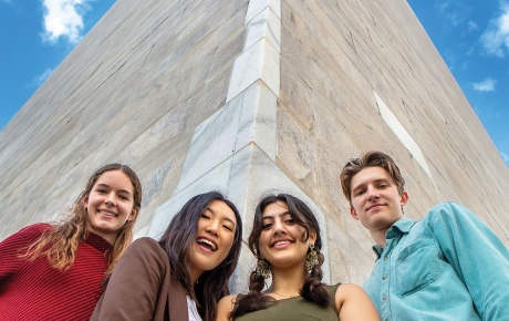 Image of Isabelle Sharon &rsquo;23.5, Alice  Im &rsquo;24, Ruhma Khawaja &rsquo;24, and author Peder Schaefer &rsquo;22.5 at the base of the Washington Monument.