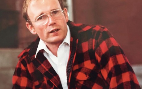 Photo of Tom Eastler &rsquo;66 in a red/black plaid coat