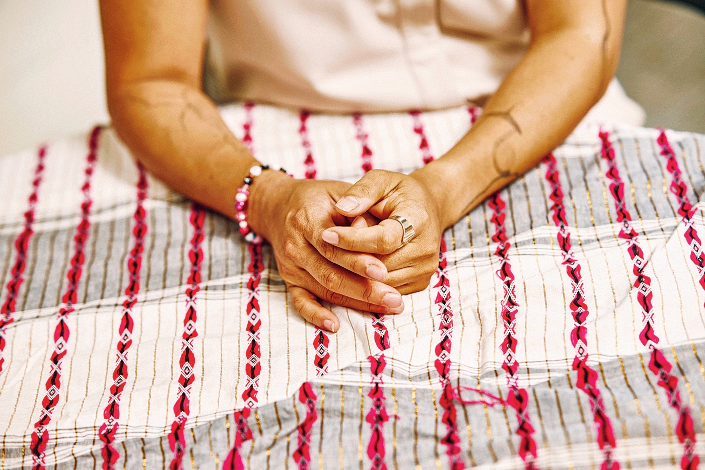 Prof Elena Shih and fabric from her travels